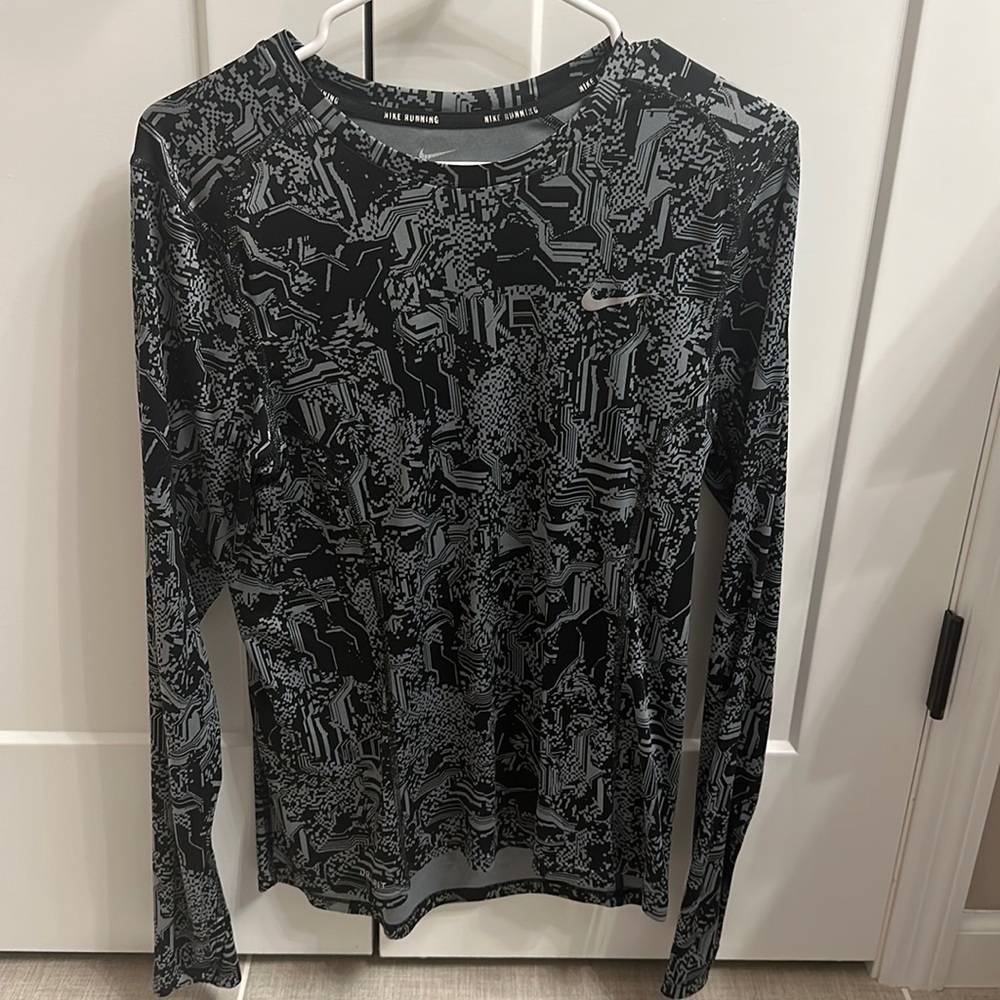 Men’s Long Sleeve Nike Dri-Fit shirt in a Men’s size Small. Great condition.
